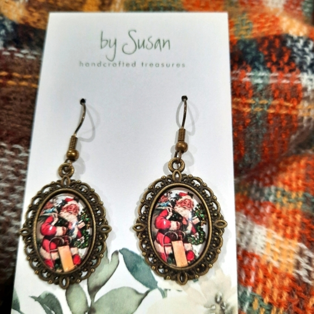 New and handcrafted dangle Santa earrings